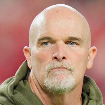 Washington Commanders head coach Dan Quinn looks on during warmups prior to the game against the Kansas City Chiefs.