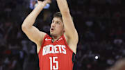 Apr 2, 2025; Houston, Texas, USA; Houston Rockets guard Reed Sheppard (15) shoots the ball during the fourth quarter against the Utah Jazz at Toyota Center. Mandatory Credit: Troy Taormina-Imagn Images