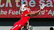 Oct 4, 2025; Raleigh, North Carolina, USA; NC State Wolfpack wide receiver Wesley Grimes (6) dives for the pass during the first half of the game against Campbell Fighting Camels at Carter-Finley Stadium. Mandatory Credit: Jaylynn Nash-Imagn Images