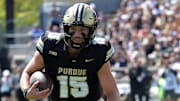 Purdue Boilermakers quarterback Ryan Browne (15) 