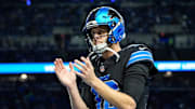 Detroit Lions quarterback Jared Goff applauds for teammates during warm up before the game between Detroit Lions and Buffalo Bills at Ford Field in Detroit on Sunday, Dec. 15, 2024.