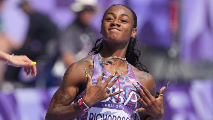 Aug 2, 2024; Paris, FRANCE; Sha'carri Richardson (USA) wins a women's 100m round 1 race during the Paris 2024 Olympic Summer Games at Stade de France. Mandatory Credit: Kirby Lee-USA TODAY Sports