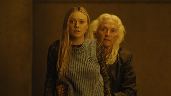 (L-r) DAKOTA FANNING as Mina and OLWEN FOUÉRÉ as Madeline in New Line Cinema’s and Warner Bros. Pictures’ fantasy thriller “THE WATCHERS,” a Warner Bros. Pictures release. - credit: Courtesy Warner Bros. Pictures