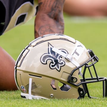 Jun 10, 2025; New Orleans, LA, USA; Detailed view of the Saints helmet during minicamp at Ochsner Sports Performance Center. Mandatory Credit: Stephen Lew-Imagn Images