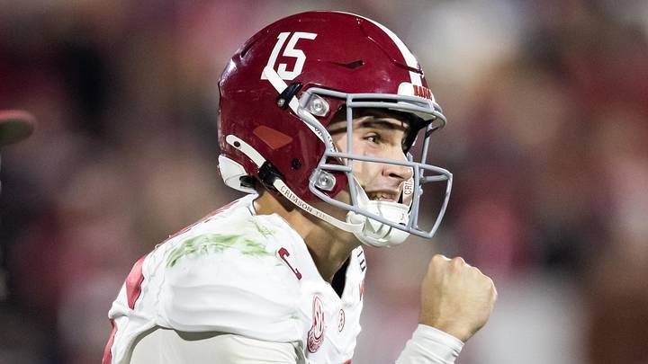 Dec 19, 2025; Norman, OK, USA; Alabama Crimson Tide quarterback Ty Simpson (15) celebrates against the Oklahoma Sooners during the CFP National Playoff First Round at Gaylord Family Oklahoma Memorial Stadium. Mandatory Credit: Mark J. Rebilas-Imagn Images