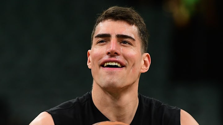 Apr 19, 2026; Boston, Massachusetts, USA; Boston Celtics center Luka Garza (52) shoots the ball during warmups prior to game one of the first round of the 2026 NBA Playoffs against the Philadelphia 76ers at TD Garden. Mandatory Credit: Bob DeChiara-Imagn Images