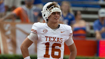 Texas quarterback Arch Manning (16) watches warm-ups before an NCAA football game against Florida in Gainesville, FL on Saturday, October 4, 2025