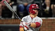 Arkansas first baseman Cam Kozeal (8) watches as he grounds out against Vanderbilt during the second inning at Hawkins Field in Nashville, Tenn.