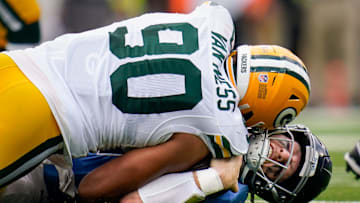 Tennessee Titans quarterback Will Levis (8) is sacked by Green Bay Packers defensive end Lukas Van Ness (90) during the second quarter at Nissan Stadium in Nashville, Tenn., Sunday, Sept. 22, 2024.