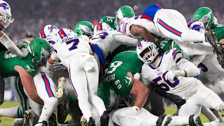 Philadelphia Eagles quarterback Jalen Hurts scores a touchdown on a sneak play against the Buffalo Bills.