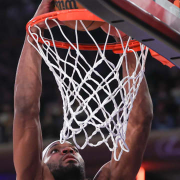 Feb 6, 2024; New York, New York, USA; New York Knicks forward Precious Achiuwa (5) dunks the ball during the first half against the Memphis Grizzlies at Madison Square Garden. Mandatory Credit: Vincent Carchietta-USA TODAY Sports