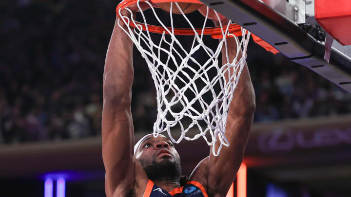 Feb 6, 2024; New York, New York, USA; New York Knicks forward Precious Achiuwa (5) dunks the ball during the first half against the Memphis Grizzlies at Madison Square Garden. Mandatory Credit: Vincent Carchietta-USA TODAY Sports