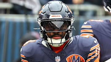 Oct 19, 2025; Chicago, Illinois, USA; Chicago Bears running back D'Andre Swift (4) reacts after rushing for a touchdown against the New Orleans Saints during the second quarter at Soldier Field.