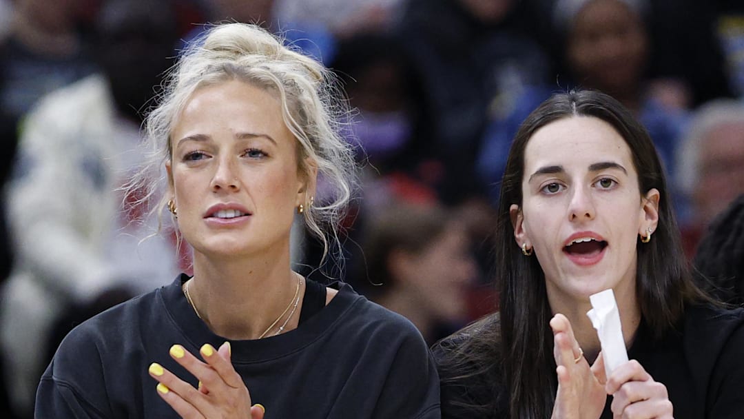 Jun 7, 2025; Chicago, Illinois, USA; Injured Indiana Fever guard Sophie Cunningham (8) and guard Caitlin Clark (22) react from the bench during the first half of a WNBA game against the Chicago Sky at United Center. Mandatory Credit: Kamil Krzaczynski-Imagn Images