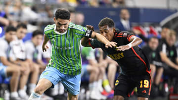 Aug 8, 2024; Seattle, Washington, USA; Seattle Sounders FC midfielder Cristian Roldan (7) controls the ball during the second half against LA Galaxy defender Mauricio Cuevas (19) at Lumen Field. Mandatory Credit: Troy Wayrynen-USA TODAY Sports