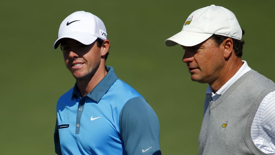 Rory McIlroy (left) walks to the 3rd tee with marker Jeff Knox during the third round of the 2014 Masters.
