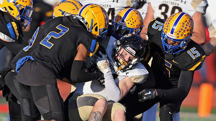 Kyshawn Robinson of Westinghouse (No. 2 ) is in on a tackle during the 2023 PIAA Class 2A state championship game. 
