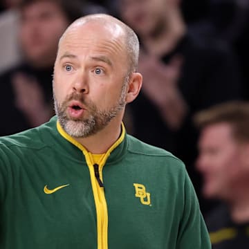 Baylor assistant coach Bill Armstrong talks to the team from the sideline.