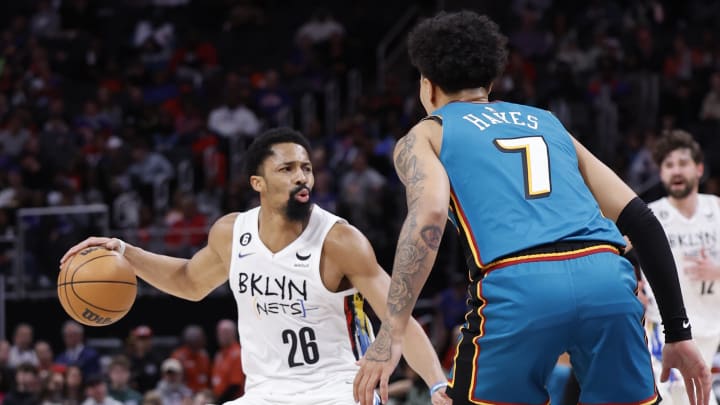 Apr 5, 2023; Detroit, Michigan, USA;  Brooklyn Nets guard Spencer Dinwiddie (26) dribbles defended by Detroit Pistons guard Killian Hayes (7): Rick Osentoski-USA TODAY Sports