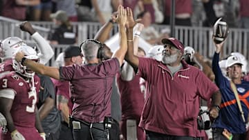 Sep 21, 2024; Tallahassee, Florida, USA; Florida State Seminoles head coach Mike Norvell and associate head coach Odell Haggins high-five after winning against the California Golden Bears at Doak S. Campbell Stadium. Mandatory Credit: Melina Myers-Imagn Images