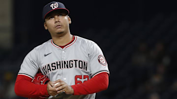 Sep 5, 2024; Pittsburgh, Pennsylvania, USA;  Washington Nationals relief pitcher Eduardo Salazar (62) reacts after issuing consecutive bases loaded walks to force in two Pittsburgh Pirates runs during the seventh inning at PNC Park