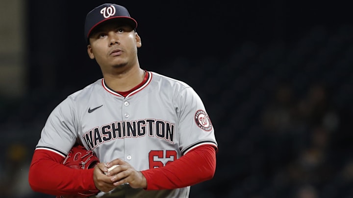 Sep 5, 2024; Pittsburgh, Pennsylvania, USA;  Washington Nationals relief pitcher Eduardo Salazar (62) reacts after issuing consecutive bases loaded walks to force in two Pittsburgh Pirates runs during the seventh inning at PNC Park