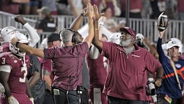 Sep 21, 2024; Tallahassee, Florida, USA; Florida State Seminoles head coach Mike Norvell and associate head coach Odell Haggins high-five after winning against the California Golden Bears at Doak S. Campbell Stadium. Mandatory Credit: Melina Myers-Imagn Images
