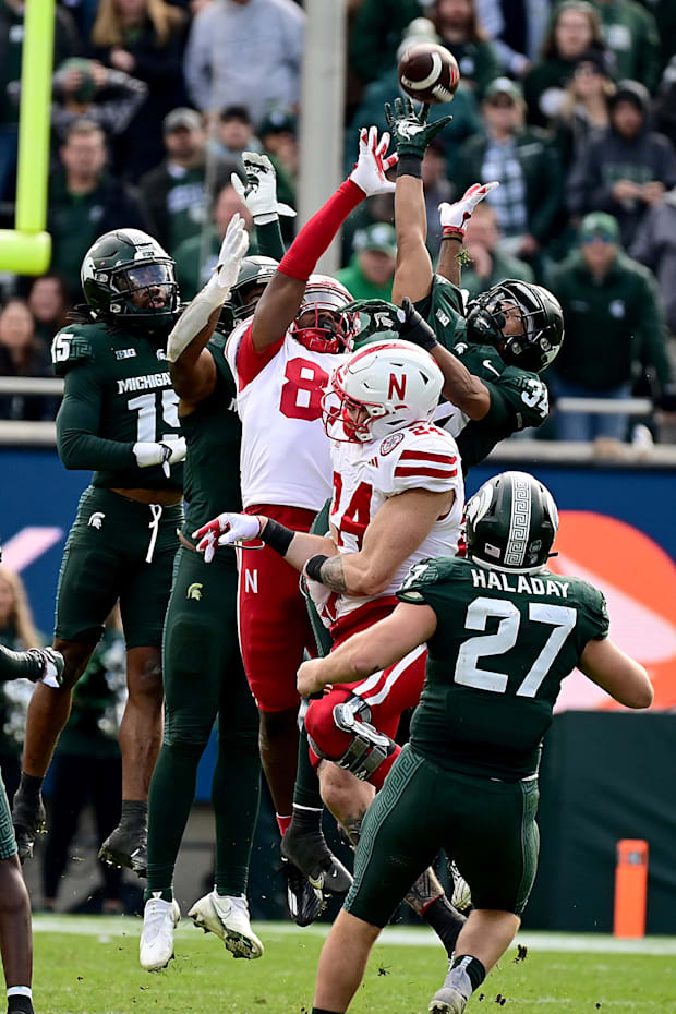 Michigan State Spartans defensive back Khalil Majeed bats the pass away from Nebraska Cornhuskers wide receiver Jaidyn Doss.