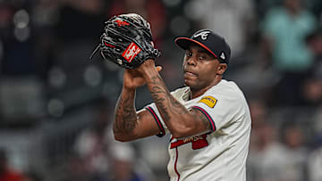 Sep 23, 2025; Cumberland, Georgia, USA; Atlanta Braves relief pitcher Raisel Iglesias (26)  reacts after the Braves defeated the Washington Nationals at Truist Park. Mandatory Credit: Dale Zanine-Imagn Images
