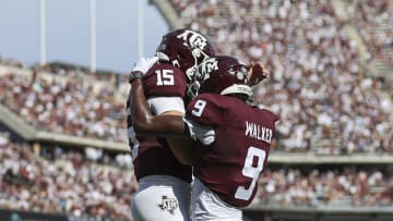 Sep 16, 2023; College Station, Texas, USA; Texas A&M Aggies quarterback Conner Weigman (15) and wide receiver Jahdae Walker (9) celebrate after a touchdown during the first quarter against the Louisiana Monroe Warhawks at Kyle Field. Mandatory Credit: Troy Taormina-USA TODAY Sports