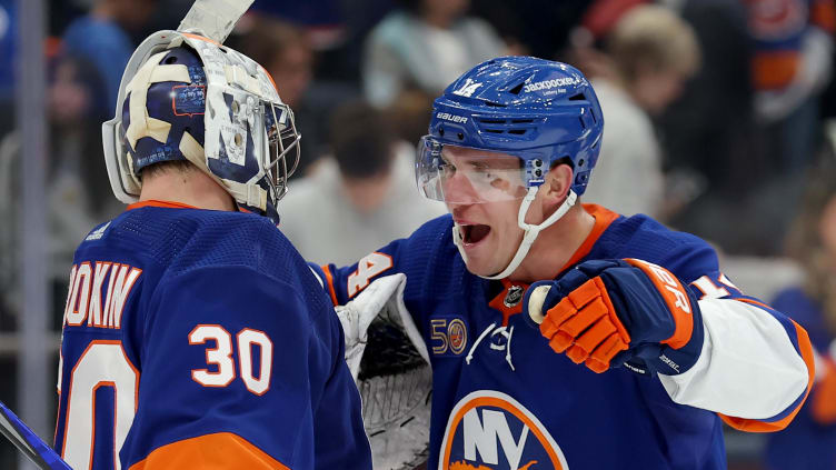 Apr 12, 2023; Elmont, New York, USA; New York Islanders center Bo Horvat (14) hugs goaltender Ilya