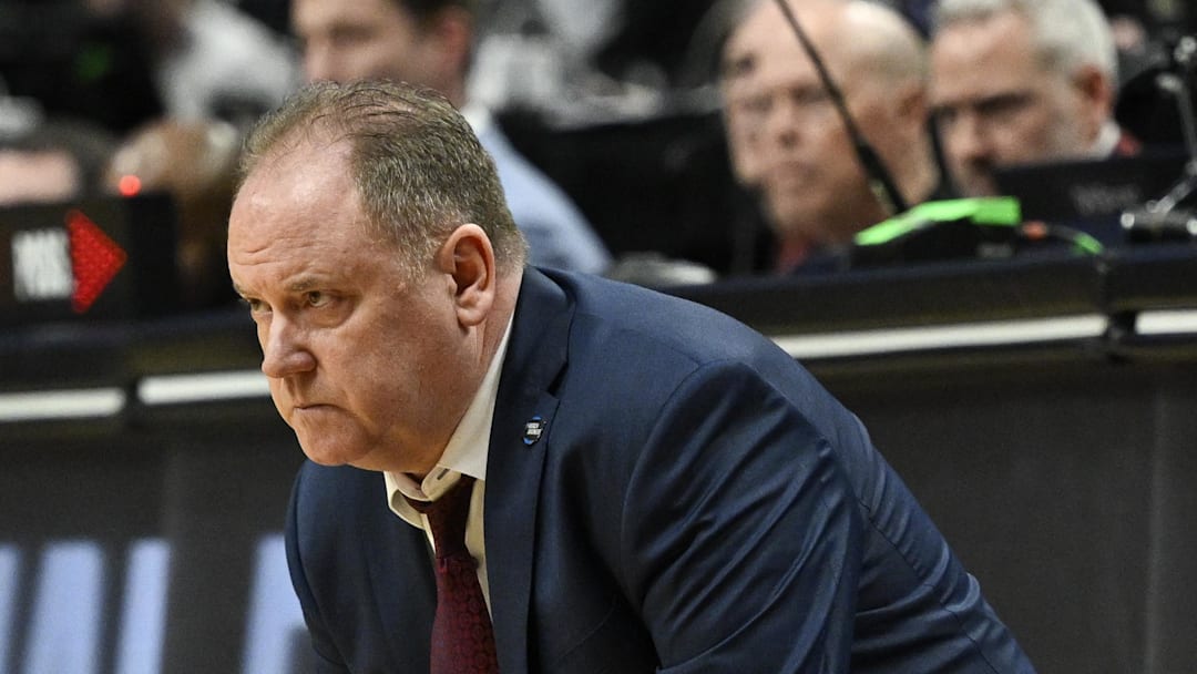 Mar 19, 2026; Portland, OR, USA; Wisconsin Badgers head coach Greg Gard reacts during the second half of a first round game of the men's 2026 NCAA Tournament against the High Point Panthers at Moda Center. Mandatory Credit: Troy Wayrynen-Imagn Images