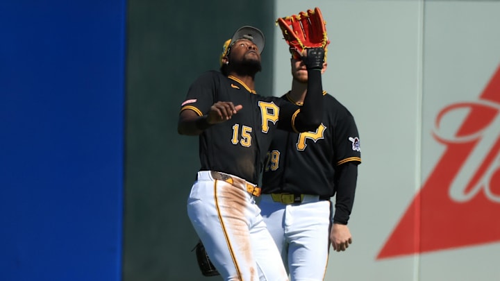 Feb 23, 2026; Bradenton, Florida, USA;  Pittsburgh Pirates center fielder Oneil Cruz (15) catches a fly ball during the second inning against the New York Yankees at LECOM Park. Mandatory Credit: Kim Klement Neitzel-Imagn Images
