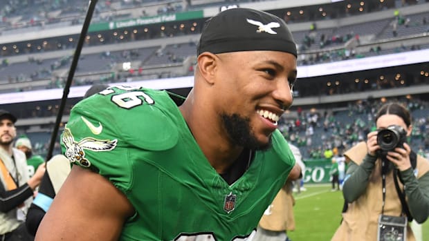 Eagles running back Saquon Barkley runs off the field