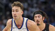 Orlando Magic forward Franz Wagner controls the ball against the Miami Heat.