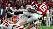 Oklahoma defensive tackle David Stone hits Alabama quarterback Ty Simpson.