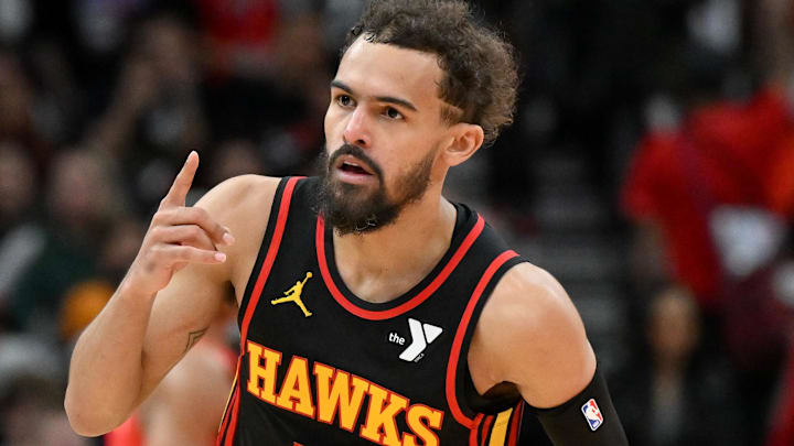Dec 29, 2024; Toronto, Ontario, CAN;  Atlanta Hawks guard Trae Young (34) reacts after making a three-point basket against the Toronto Raptors in the second half at Scotiabank Arena. Mandatory Credit: Dan Hamilton-Imagn Images
