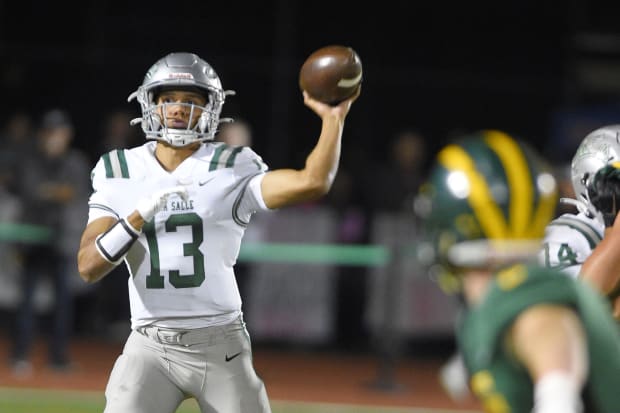 Toa Faavae (13) is not only one of the region's best quarterbacks, he's surely the fastest. Accounted for nearly 600 yards in last 2 state title games