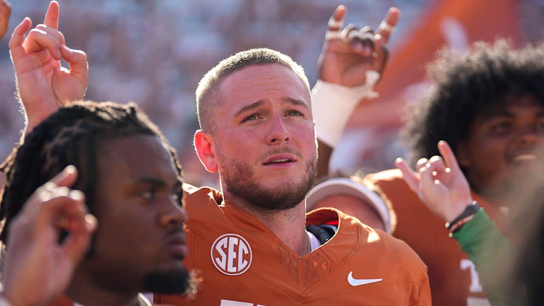 Aug 31, 2024; Austin, Texas, USA; Texas Longhorns quarterback Quinn Ewers (3) holds up the sign of the horns to celebrate the 52-0 victory over the Colorado State Rams at Darrell K Royal-Texas Memorial Stadium. 