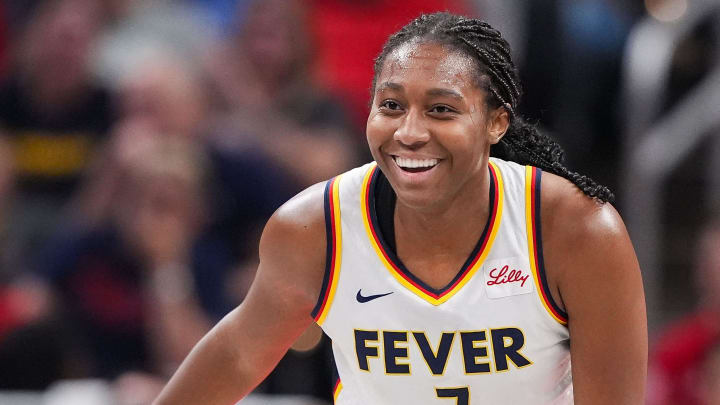 Indiana Fever forward Aliyah Boston (7) smiles after scoring Friday, July 12, 2024, during the game at Gainbridge Fieldhouse in Indianapolis. The Indiana Fever defeated the Phoenix Mercury, 95-86.