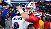 Baltimore Ravens quarterback Lamar Jackson and Buffalo Bills quarterback Josh Allen embrace following the game at New Era Field.