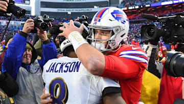Baltimore Ravens quarterback Lamar Jackson and Buffalo Bills quarterback Josh Allen embrace following the game at New Era Field.