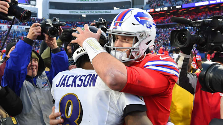 Baltimore Ravens quarterback Lamar Jackson and Buffalo Bills quarterback Josh Allen embrace following the game at New Era Field. Baltimore Ravens quarterback Lamar Jackson and Buffalo Bills quarterback Josh Allen embrace following the game at New Era Field.