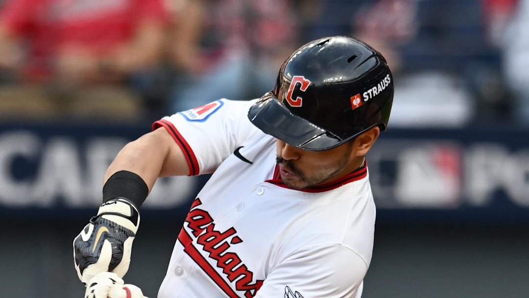 Cleveland Guardians outfielder Steven Kwan hits a double in the eighth inning against the Detroit Tigers.