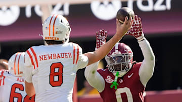 Nov 16, 2024; Tuscaloosa, AL, USA; Alabama Crimson Tide linebacker Deontae Lawson (0) deflects a pass from Mercer quarterback Whitt Newbauer (8) that was intercepted by Alabama at Bryant-Denny Stadium. Mandatory Credit: Gary Cosby Jr.-Tuscaloosa News