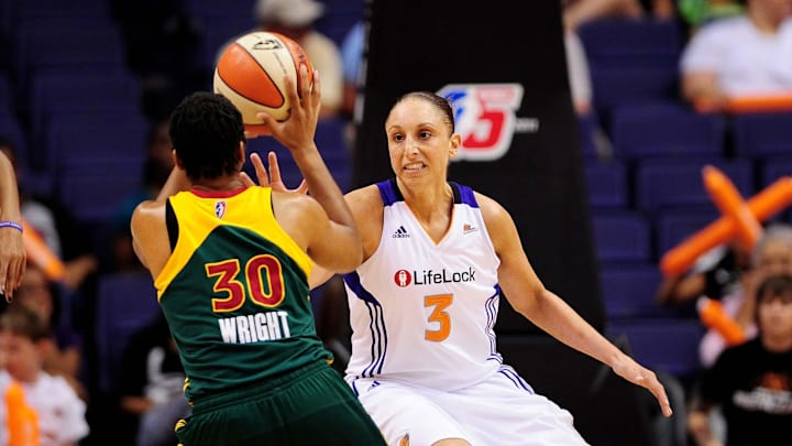 Sep 17 2011; Phoenix, AZ, USA; Phoenix Mercury guard Diana Taurasi (3) guards the Seattle Storm guard Tanisha Wright (30) during the first half at the US Airways Center.  The Mercury defeated the Storm 92 - 83. Mandatory Credit: Jennifer Stewart-Imagn Images