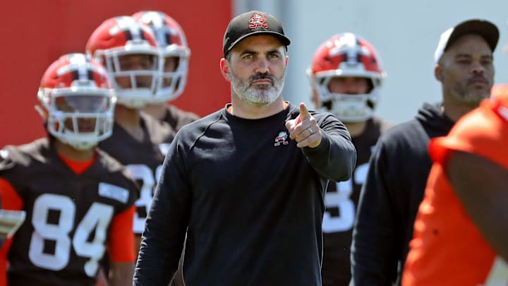 Cleveland Browns coach Kevin Stefanski watches quarterback Shedeur Sanders (12) participate in drills during day two of NFL rookie minicamp at the Cleveland Browns training facility May 10, 2025, in Berea, Ohio. Cleveland Browns coach Kevin Stefanski watches quarterback Shedeur Sanders (12) participate in drills during day two of NFL rookie minicamp at the Cleveland Browns training facility May 10, 2025, in Berea, Ohio.