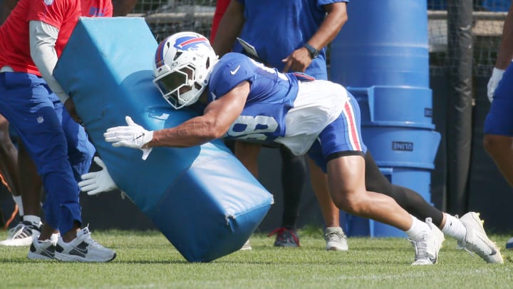 Bills linebacker Matt Milano dives at a blocker during drills.