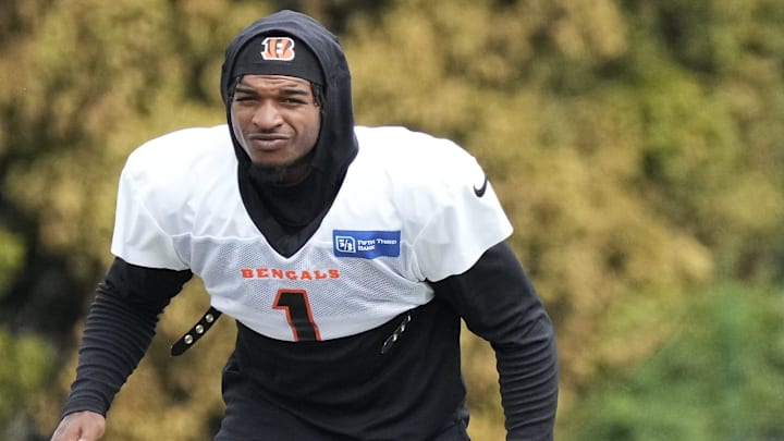 Cincinnati Bengals wide receiver Ja'Marr Chase (1) warms up during training camp practice at the Paycor Stadium practice facility in downtown Cincinnati on Wednesday, Aug. 10, 2022.