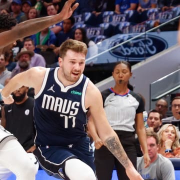 Oct 27, 2023; Dallas, Texas, USA; Dallas Mavericks guard Luka Doncic (77) drives on Brooklyn Nets forward Dorian Finney-Smith (28) during the second quarter at American Airlines Center. Mandatory Credit: Andrew Dieb-USA TODAY Sports